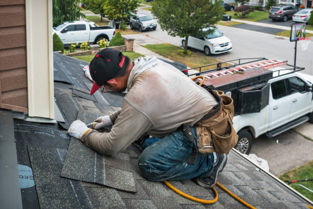 Professional Emergency Roof Repair technician working in Brightwaters, NY